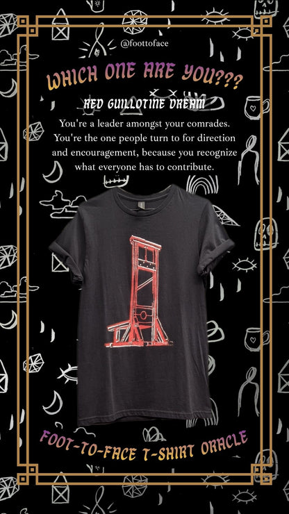 A black crewneck t-shirt featuring a red guillotine graphic, presented on a dark chalkboard-style background with white doodles and gold decorative borders. Text overlays describe the 'Red Guillotine Dream' and 'Foot-To-Face T-Shirt Oracle' by @foottoface. Caption says: "Red Guillotine Dream - You're a leader amongst your comrades. You're the one people turn to for direction and encouragement, because you recognize what everyone has to contribute."